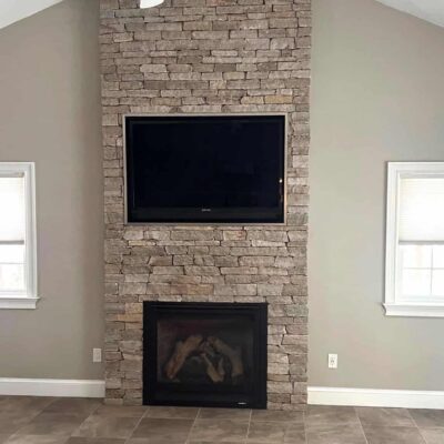 Colonial Tan Ledgestone fireplace installed by Dean Pellegrino