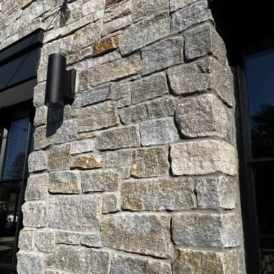 Aura Apartments by Chris Crimi Masonry - Newport Mist Ashlar and Boston Blend Ledgestone