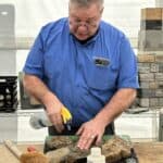 David Croteau demonstrates cleaning stone veneer.