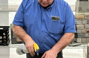 David Croteau demonstrates cleaning stone veneer.