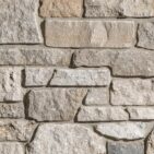Grayson Stacked Stone thin veneer limestone close-up showing cream, beige, and grey tones with mortar joints