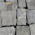 Aspen Ridge Sq & Rec thin veneer limestone third close-up showing large square limestone pieces with natural split face texture in cool grey